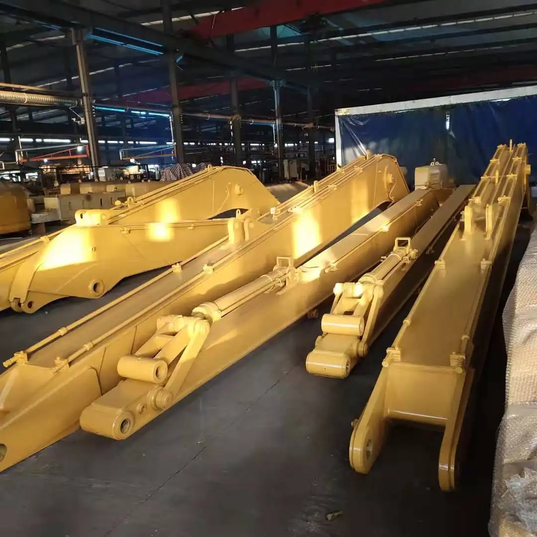 What causes an excavator boom to crack?